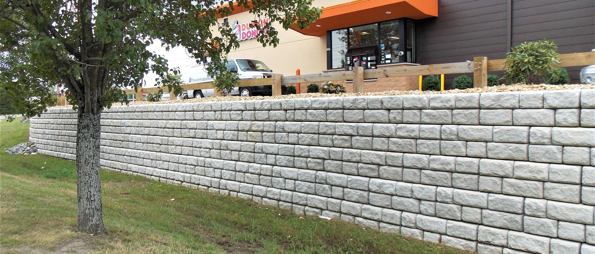 Redi-Rock Retaining wall at a Dunkin Donuts Drive-through