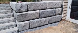Home with Redi-Rock Retaining wall